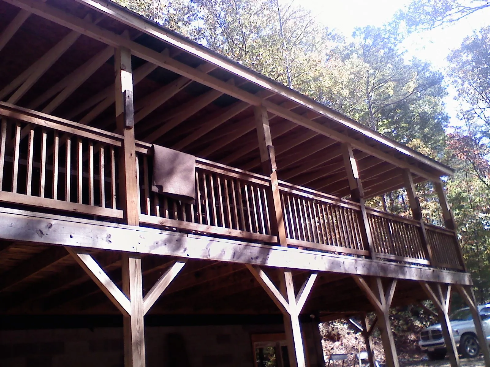 Timber framing under a new elevated porch and deck — Roof Leak Repair in Ninnekah by Roofing Brothers